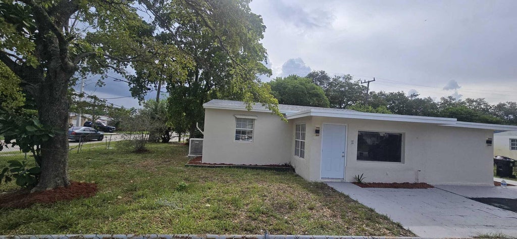 Photo of 1101 NW 23RD Terrace, Fort Lauderdale, FL 33311 (MLS # B26058592)