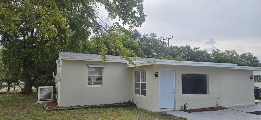Photo of 1101 NW 23RD Terrace, Fort Lauderdale, FL 33311 (MLS # B26058592)