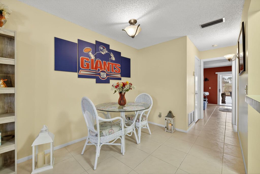 Photo of 23 Lake Vista Trail #204, Port Saint Lucie, FL 34952 (MLS # B26027674)