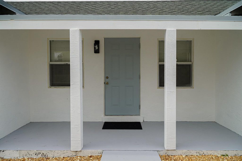 Photo of 908 W 5th Street, Riviera Beach, FL 33404 (MLS # R11144030)