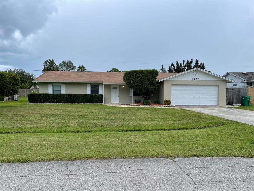 Photo of 1197 SW Heather Street, Port Saint Lucie, FL 34983 (MLS # R10760686)