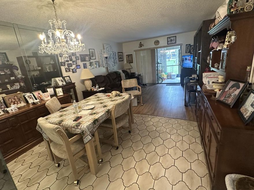 This is a beautiful home in this 55+ community! This centrally located gem is just minutes away from everything you need, from the beach to the shopping center and airports. Step inside, fall in love and enjoy the modern contemporary design. The spacious living and dining rooms, and a fully functional kitchen with all new appliances will make your life much easier. Sip your morning coffee and enjoy the gorgeous garden view from your screened balcony in a private corner of this fully spacious 2/2 unit. This is a over 1,200 sq ft of living space, with a spacious walk-in closet in the Master, and a stackable washer/dryer. The convenience of an assigned parking spot is at the front door. Amenities include 2 heater pools, tennis courts, a shuffleboard, billiards and a clubhouse.