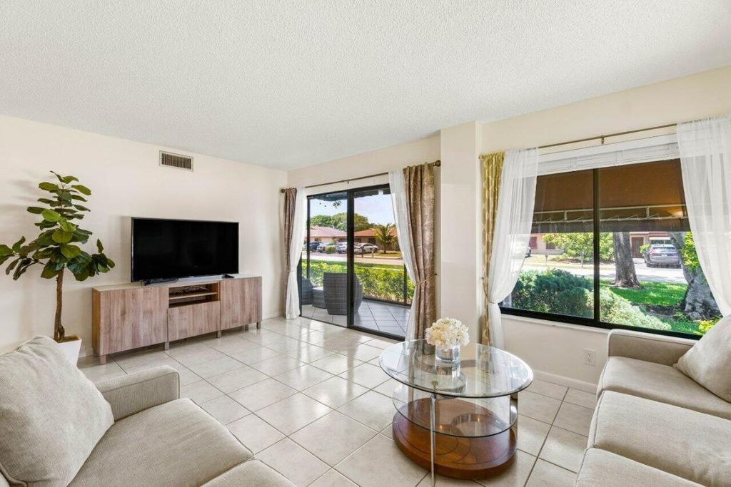 Photo of 5040 Rose Hill Drive #105, Boynton Beach, FL 33437 (MLS # R10986614)