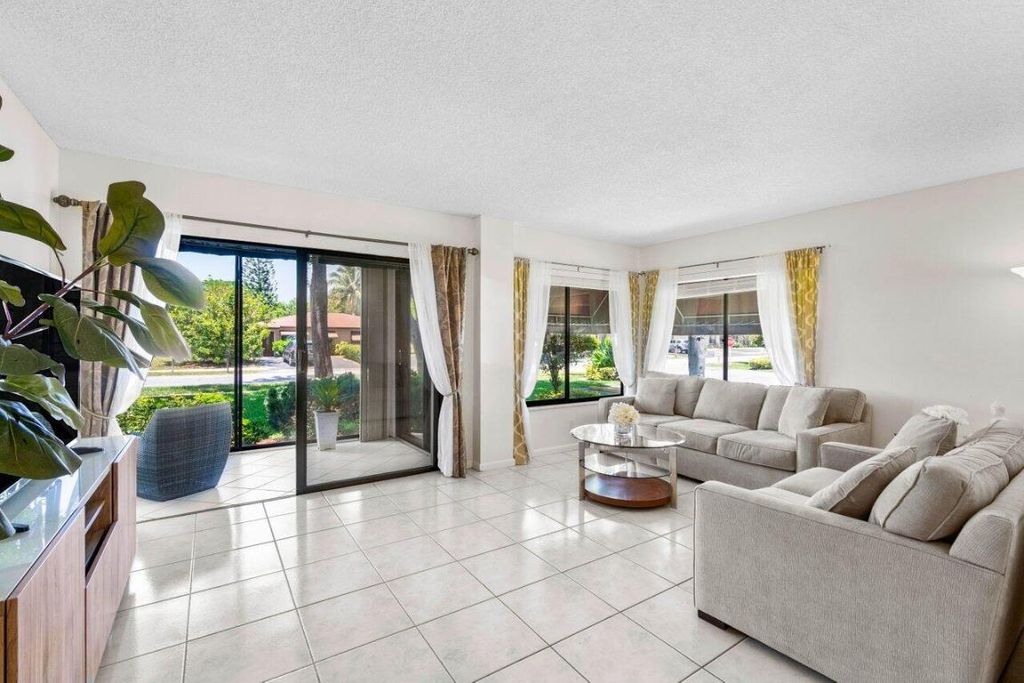 Photo of 5040 Rose Hill Drive #105, Boynton Beach, FL 33437 (MLS # R10986614)