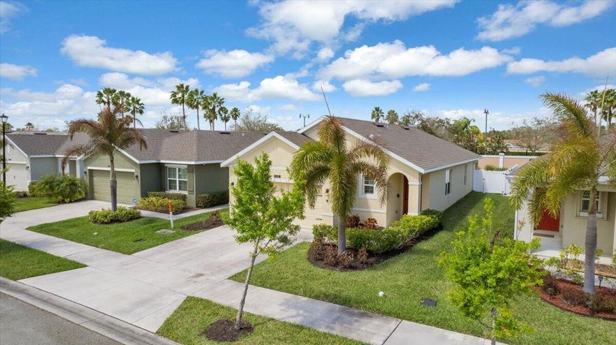 Beautiful Home located at Victoria Parc in Tradition close to schools, hospital, shopping, restaurants & wonderful downtown area! Features CBS Construction, 3 Bedrooms, 2 Baths, 2 Car Garage & fabulous backyard private space! Open Kitchen boast upgraded cabinets, granite counter tops, stainless steel appliances, new deep stainless sink, island w/breakfast bar, wine fridge on coffee bar with floating shelves. Details include tile in the main area, split floor plan, blinds, drapes & upgraded lighting. Enjoy the private covered patio 14 x 6 with extended paver lanai 30 x 16, large yard, tropical setting & fenced in yard. Shows like a MODEL & in excellent condition! Tradition is a Master Planned community where you will find something for everyone! Don't wait to build! A/C - 2025, WH- 2020.  The Treasure Coast has beautiful waterways for fishing, boating & beaches. Port St Lucie is one of the fastest going cities in the US. Only 45 minutes from Palm Beach Airport perfect for traveling.