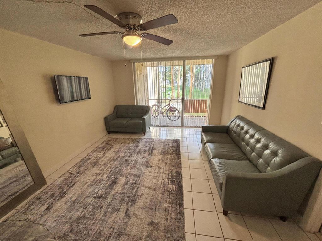 Photo of 3121 NW 47th Terrace #107, Lauderdale Lakes, FL 33319 (MLS # B26000199)