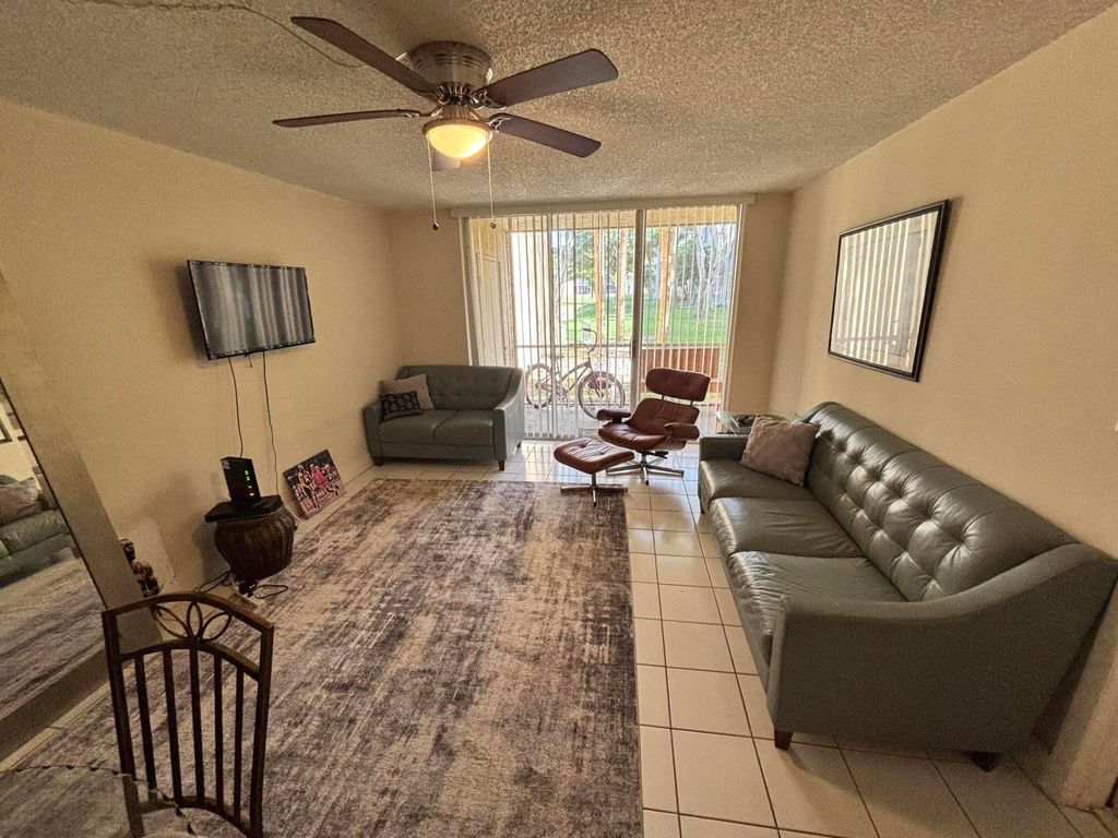 Photo of 3121 NW 47th Terrace #107, Lauderdale Lakes, FL 33319 (MLS # B26000199)