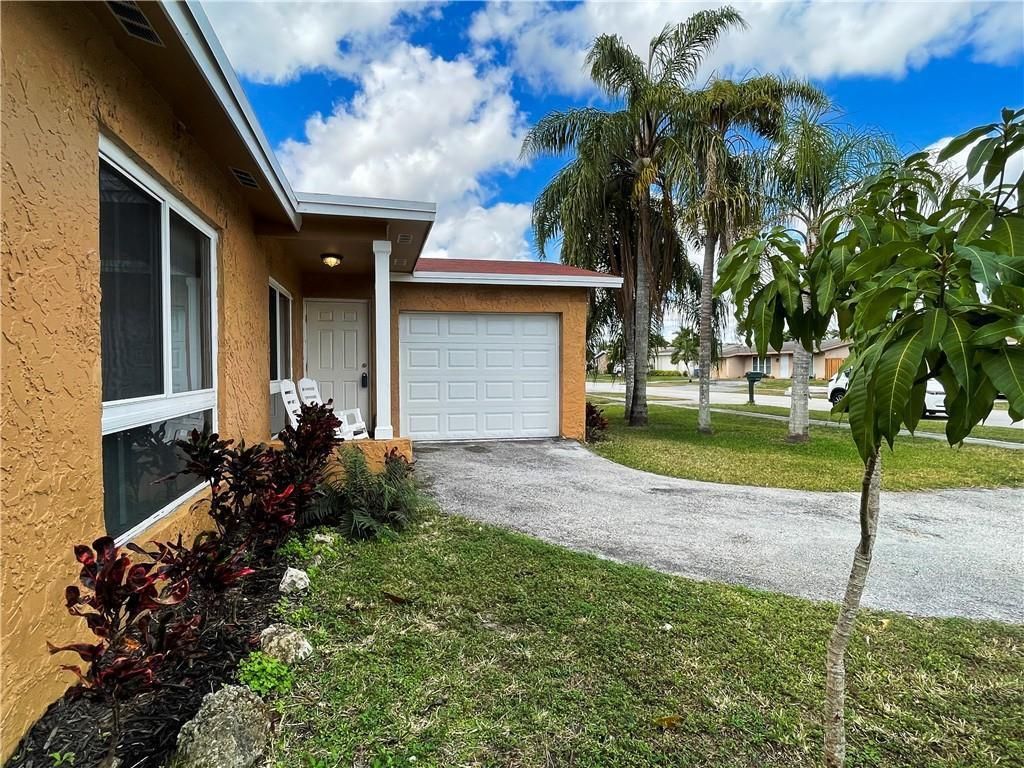 Photo of 11420 NW 35th Street, Sunrise, FL 33323 (MLS # B26019065)