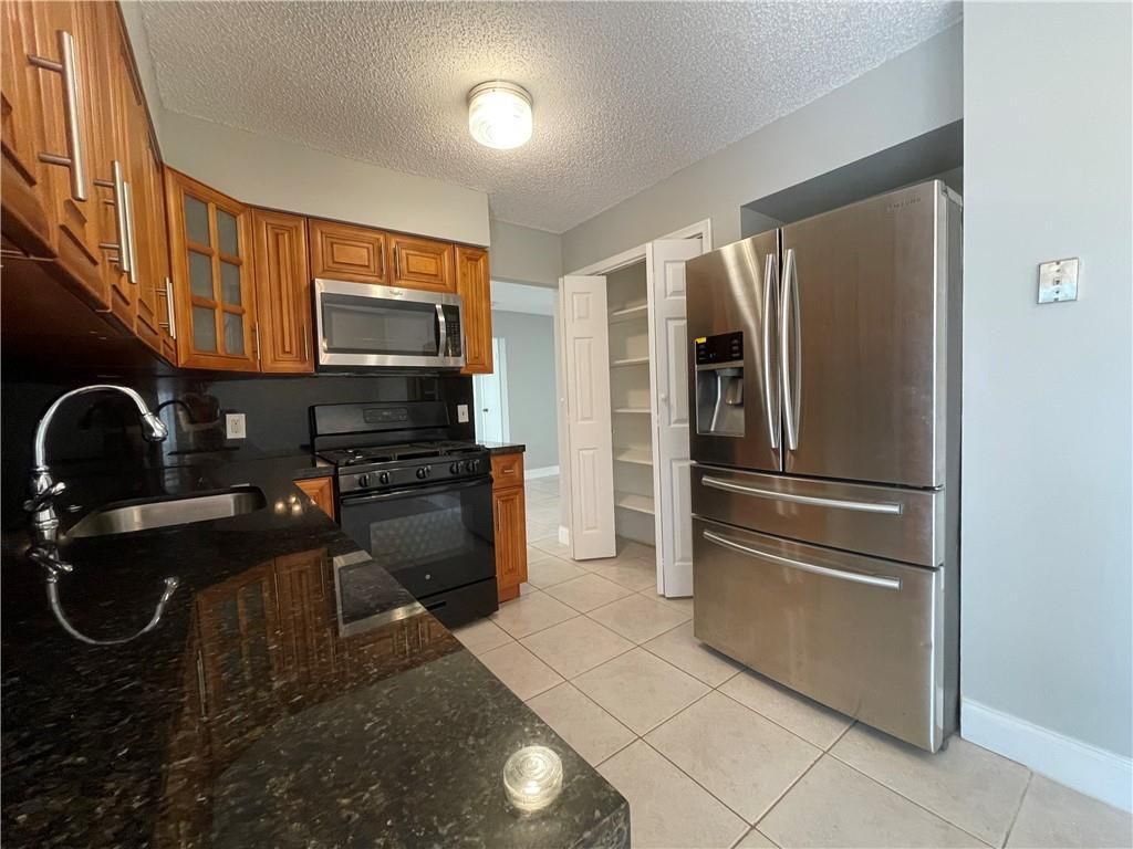 Photo of 11420 NW 35th Street, Sunrise, FL 33323 (MLS # B26019065)
