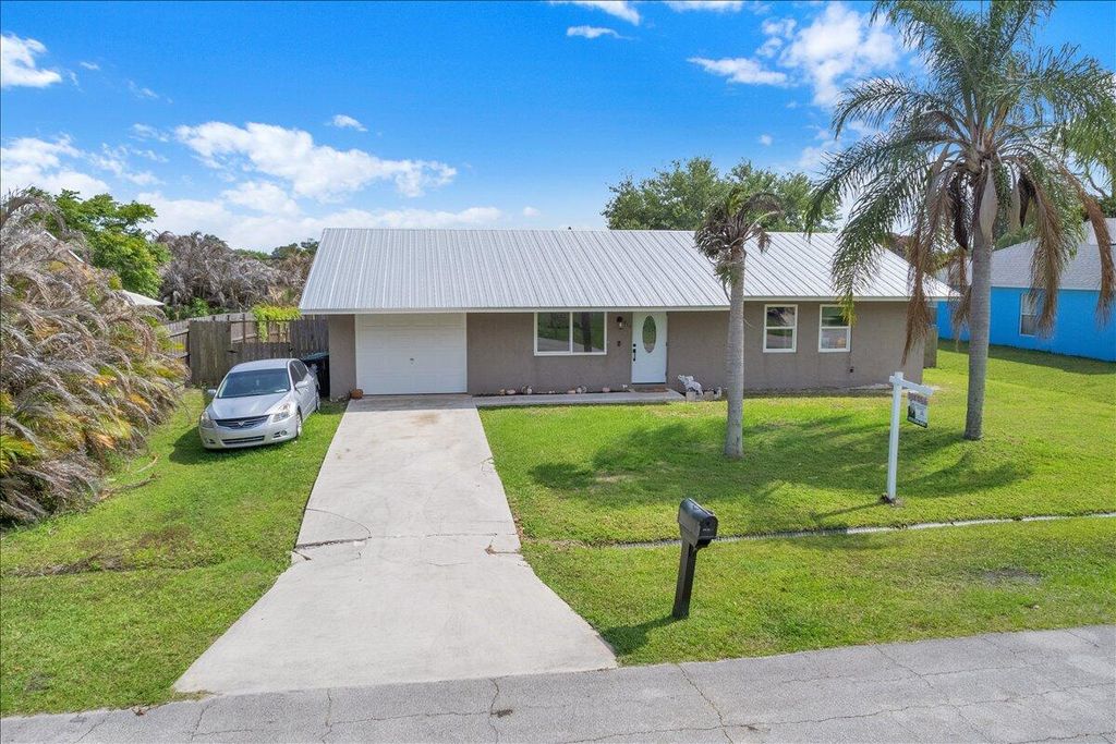 Photo of 956 SE Browning Avenue, Port Saint Lucie, FL 34983 (MLS # B26016066)