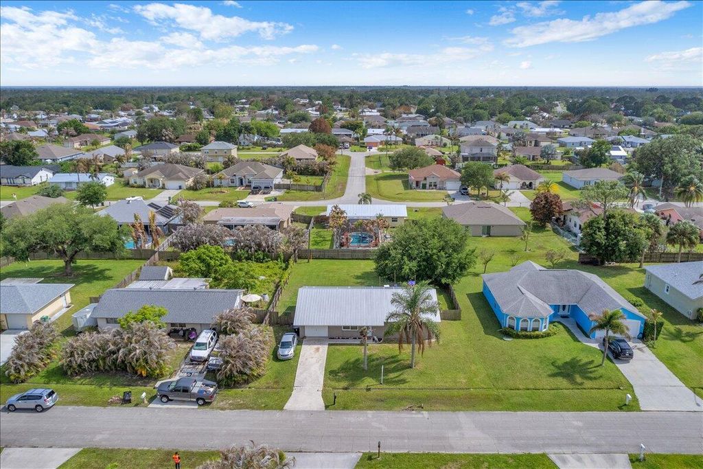 Photo of 956 SE Browning Avenue, Port Saint Lucie, FL 34983 (MLS # B26016066)