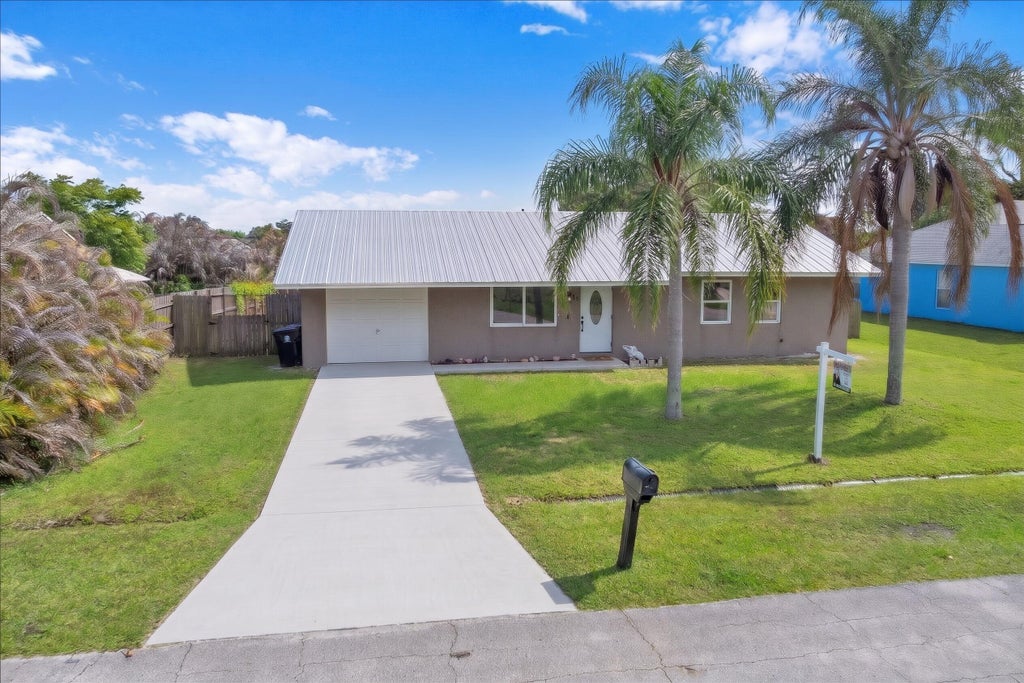 Photo of 956 SE Browning Avenue, Port Saint Lucie, FL 34983 (MLS # B26016066)