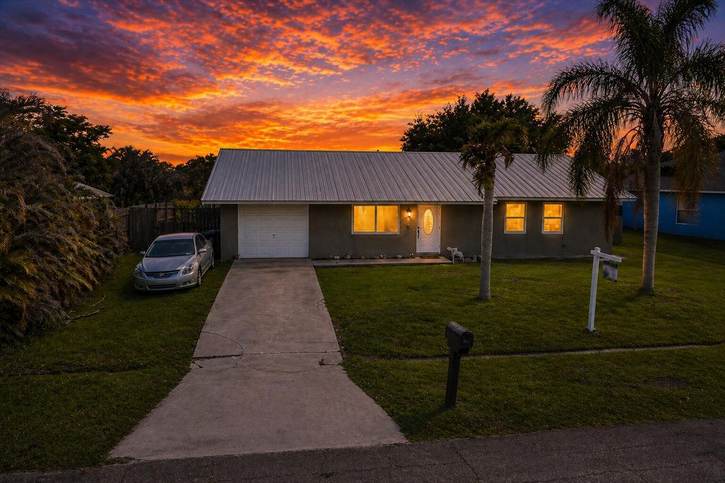 Photo of 956 SE Browning Avenue, Port Saint Lucie, FL 34983 (MLS # B26016066)