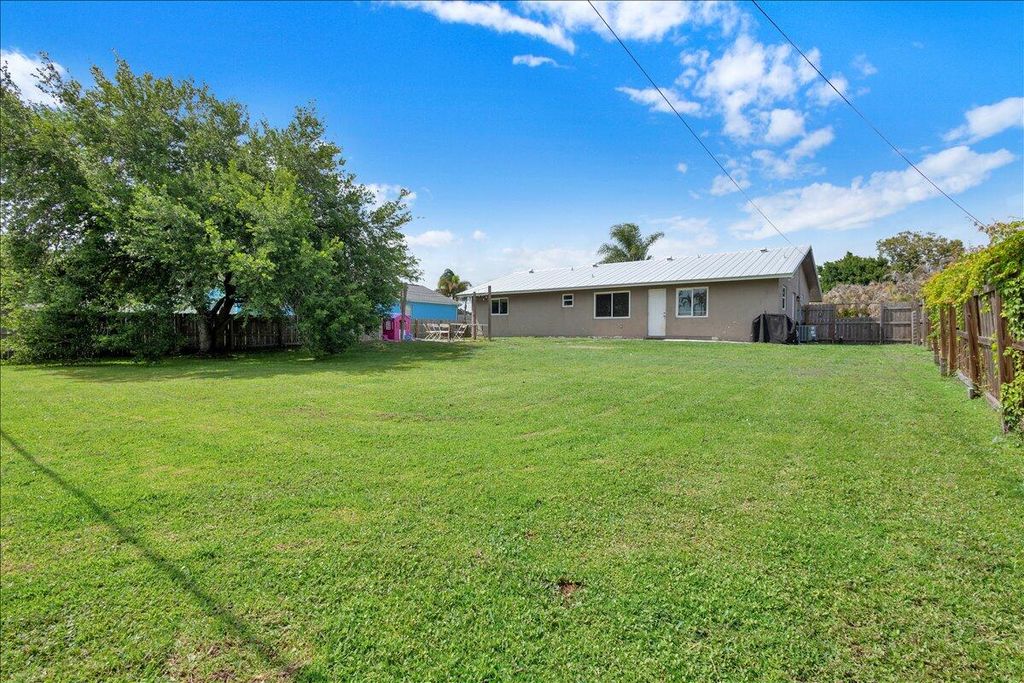 Photo of 956 SE Browning Avenue, Port Saint Lucie, FL 34983 (MLS # B26016066)