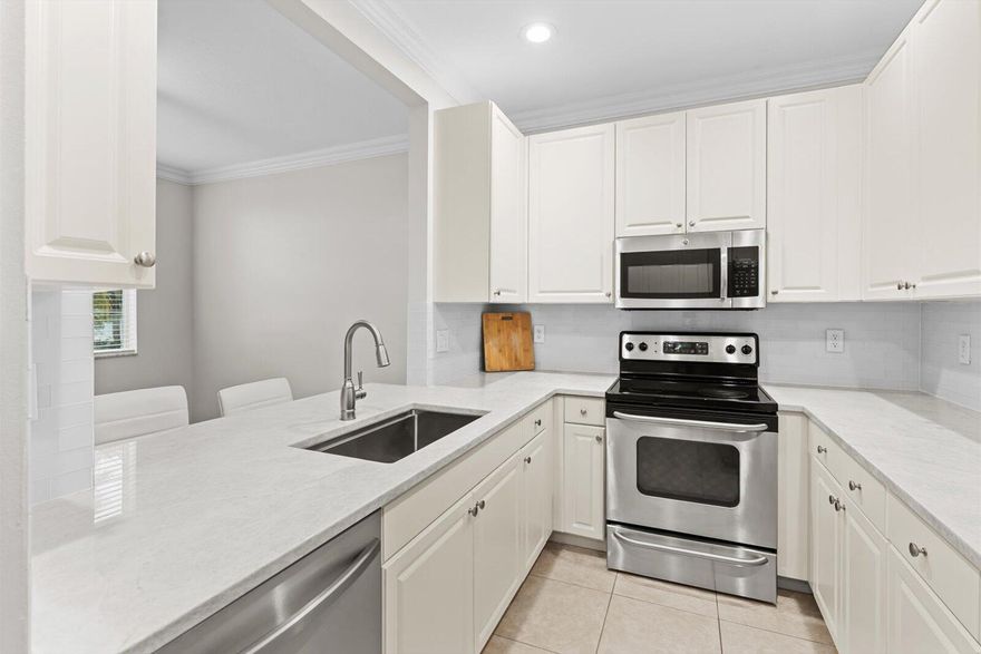 MASSIVE PRICE IMPROVEMENT! NEW ROOF, NEW A/C, ALL BATHROOMS AND KITCHEN UPDATEDBeautifully updated townhome in the heart of Jupiter! This move-in-ready residence features a brand-new roof (2024), A/C (2024), and tastefully updated kitchen and baths for a modern coastal feel. The bright, open layout is perfect for relaxing or entertaining, with a stylish kitchen offering quartz countertops, shaker cabinetry, and stainless-steel appliances. Enjoy your morning coffee or evening breeze on the private balcony or patio. Additional highlights include a two-car garage, full laundry room, and abundant storage. Ideally located near Abacoa Town Center, Roger Dean Stadium, top-rated schools, golf, dining, and Jupiter's world-class beaches.