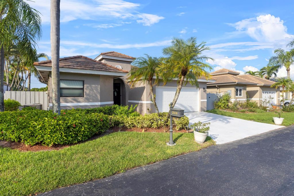Photo of 211 Disc Drive, Boynton Beach, FL 33436 (MLS # R11031960)