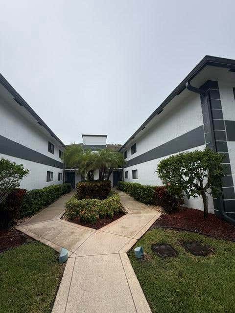 Photo of 15364 LAKES OF DELRAY Boulevard #49, Delray Beach, FL 33484 (MLS # B26061069)