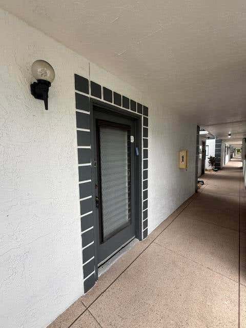 Photo of 15364 LAKES OF DELRAY Boulevard #49, Delray Beach, FL 33484 (MLS # B26061069)
