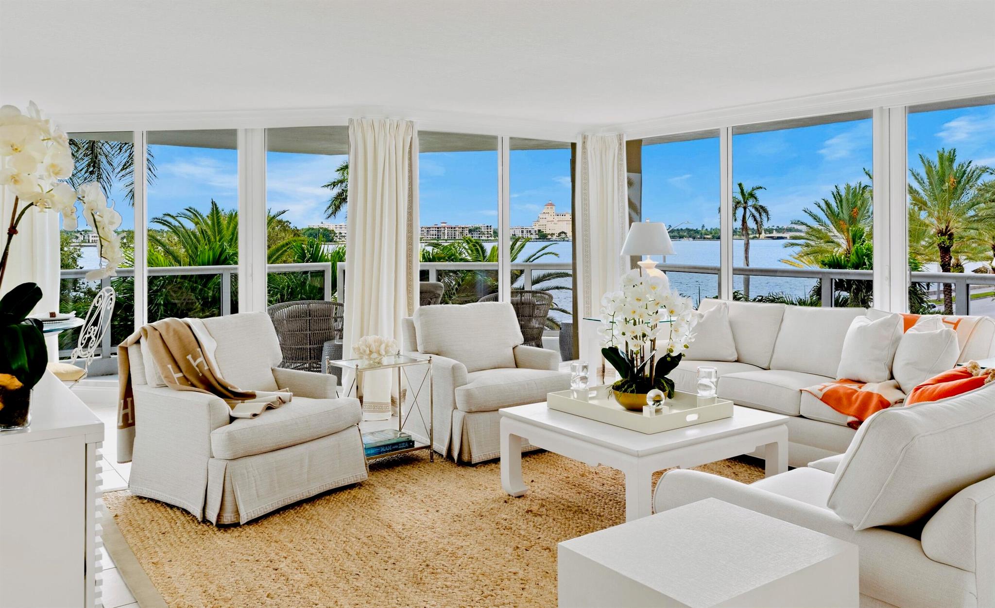 DIRECT EAST STUNNING INTRACOASTAL VIEWS from every room in this beautifully furnished 3 Bedroom, 2.5 Bath residence. Enjoy breathtaking sunrises and yachts cruising by this oversized waterfront wraparound terrace. All bedrooms have spectacular water views and TVs. The 3rd bedroom/den/office has a queen size pull-out sofa. Professionally decorated with designer furnishings, this spacious unit boasts 100 feet of floor-to-ceiling glass. Enjoy in-unit laundry, a flexible floor plan, impact glass, and two underground parking spaces. Available for Dec & Jan or annually starting May 1, 2025 . Located in the exclusive Villa del Lago, a 23-unit boutique building on the picturesque Flagler Drive waterfront. Building amenities includes 24-hour doorman, fitness center, two heated pools, library...
