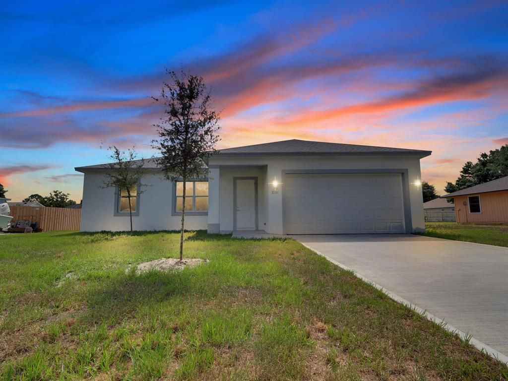 Photo of 5206 Paleo Circle Cir, Fort Pierce, FL 34951 (MLS # R10820305)