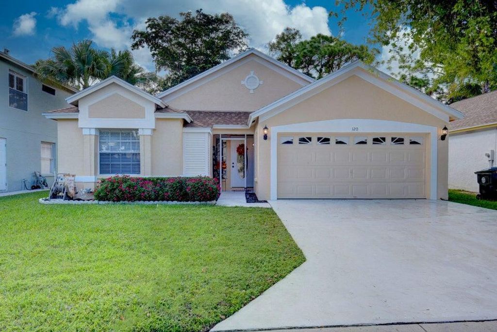 Photo of 120 Paddock Lane, Greenacres, FL 33413 (MLS # R10918913)