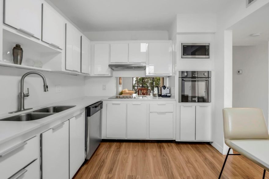 Lovingly renovated 2/2 in Weston. Property enjoys plenty of natural light and a great water view. Remodeled bathrooms with ToTo Washlet bidet.  Remodeled kitchen with new quartz counter tops, new wall oven, new dishwasher, new floors.  Unit is freshly painted (popcorn ceiling removed).  New water heater and new electrical box.  Near I-75 and 595, with A+ public schools and membership to the Bonaventure Racquet Club, this an incredible opportunity.  Plenty os guest parking. Enjoy all the advantages of living in one of Florida's most coveted communities. ***No Special Assessments***