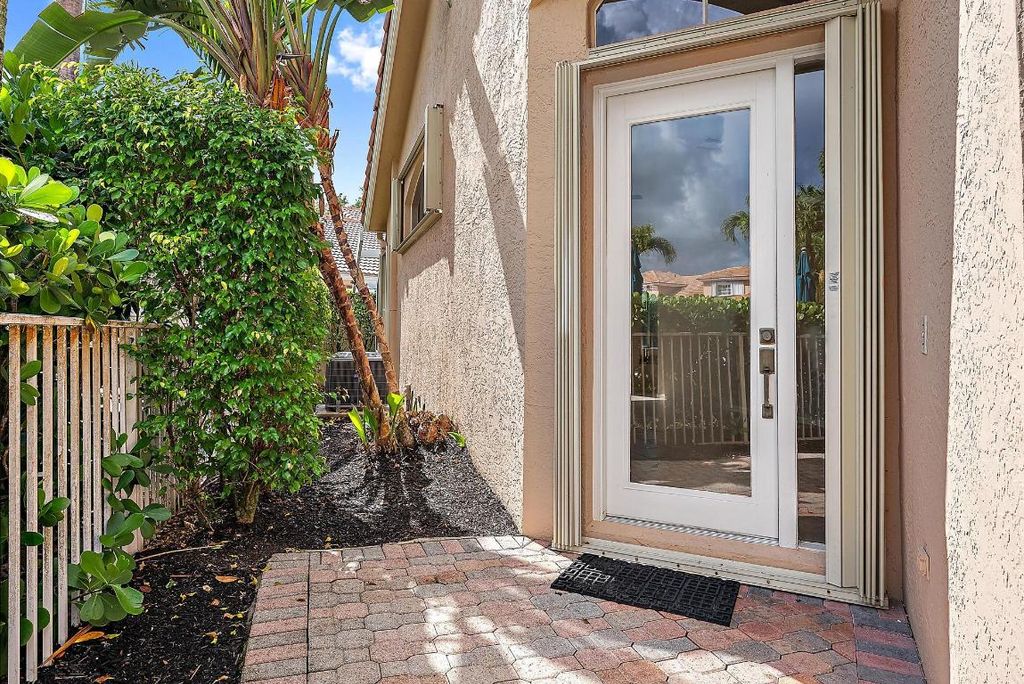 Photo of 8150 Sandpiper Way, West Palm Beach, FL 33412 (MLS # R11088729)