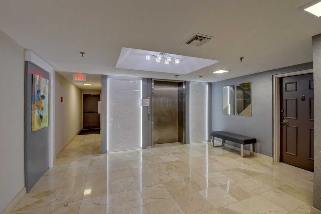 Photo of 7194 Promenade Drive #202, Boca Raton, FL 33433 (MLS # B26022122)
