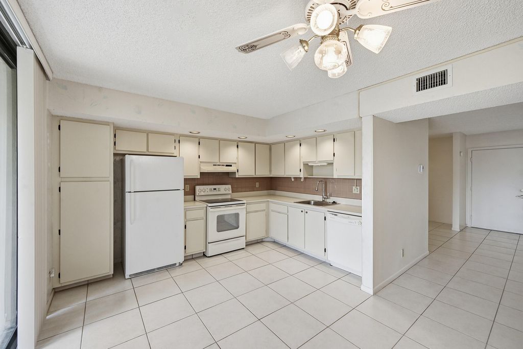 Photo of 5370 Las Verdes Circle #219, Delray Beach, FL 33484 (MLS # B26017082)