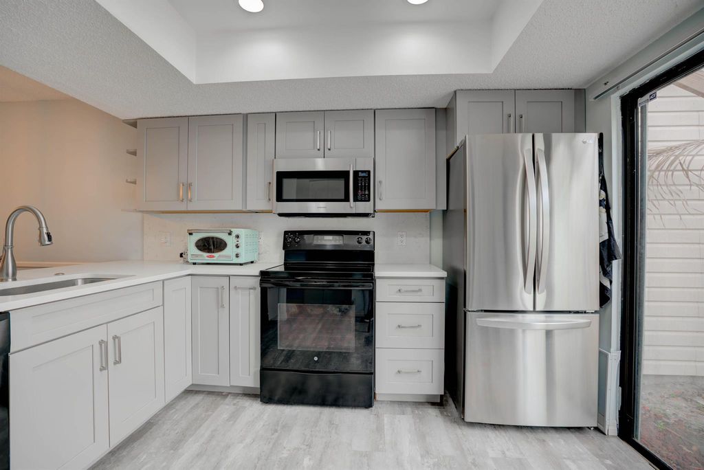 Photo of 116 Sherwood Circle #7c, Jupiter, FL 33458 (MLS # R10972895)