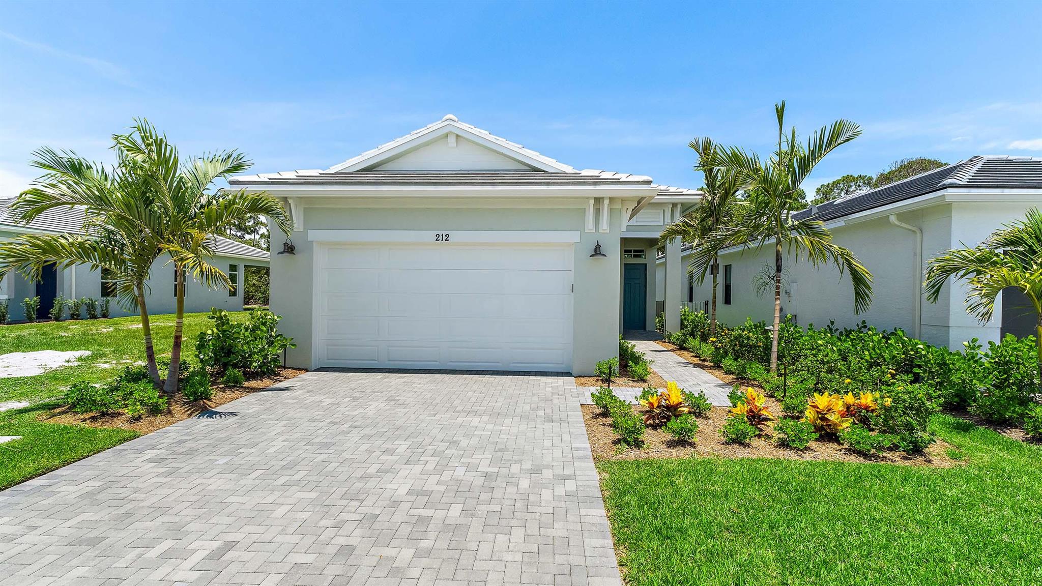 **NEW CONSTRUCTION** This Caroline floorplan offers the perfect blend of luxury and tranquility in the gated community of Rivella, surrounded by over 140 acres of natural preserve and mature trees. Nestled on a preserve-view homesite with no rear neighbors, this thoughtfully designed 3-bedroom, 2-bath home also features a versatile Flex Room, providing extra space for work or relaxation. Step inside to soaring 11'4'' ceilings in the main living area, creating an inviting, open ambiance filled with natural light streaming through expansive 9x10 sliding glass doors. The gourmet kitchen shines with sleek quartz countertops, natural gas appliances, and high-end finishes, ensuring both everyday functionality and effortless entertaining.
