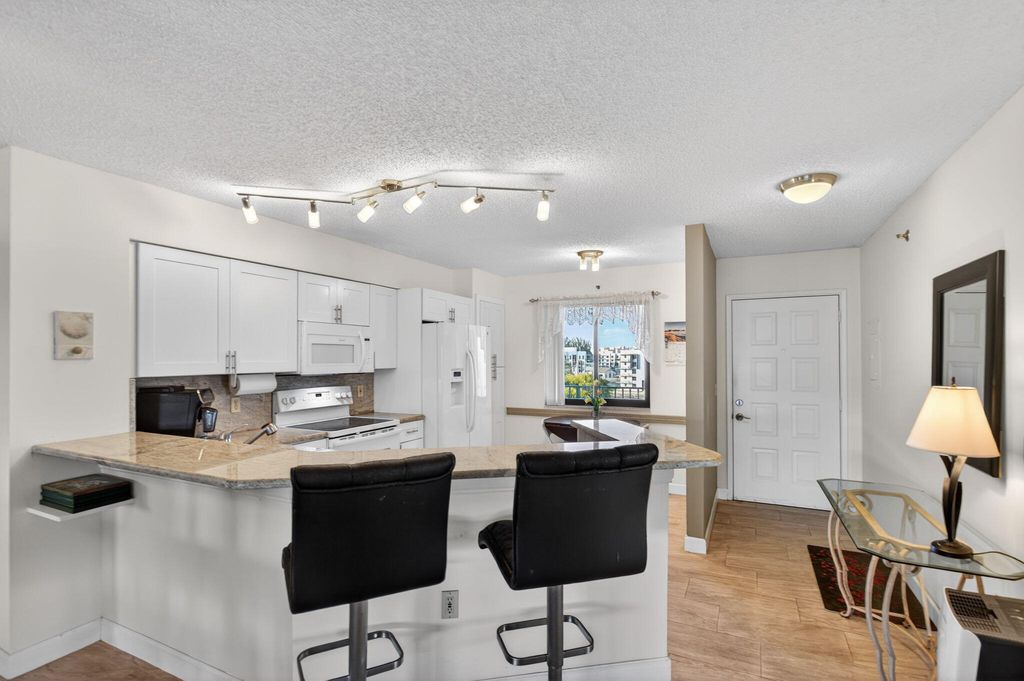 Photo of 2240 N Cypress Bend Drive #601, Pompano Beach, FL 33069 (MLS # R11156249)