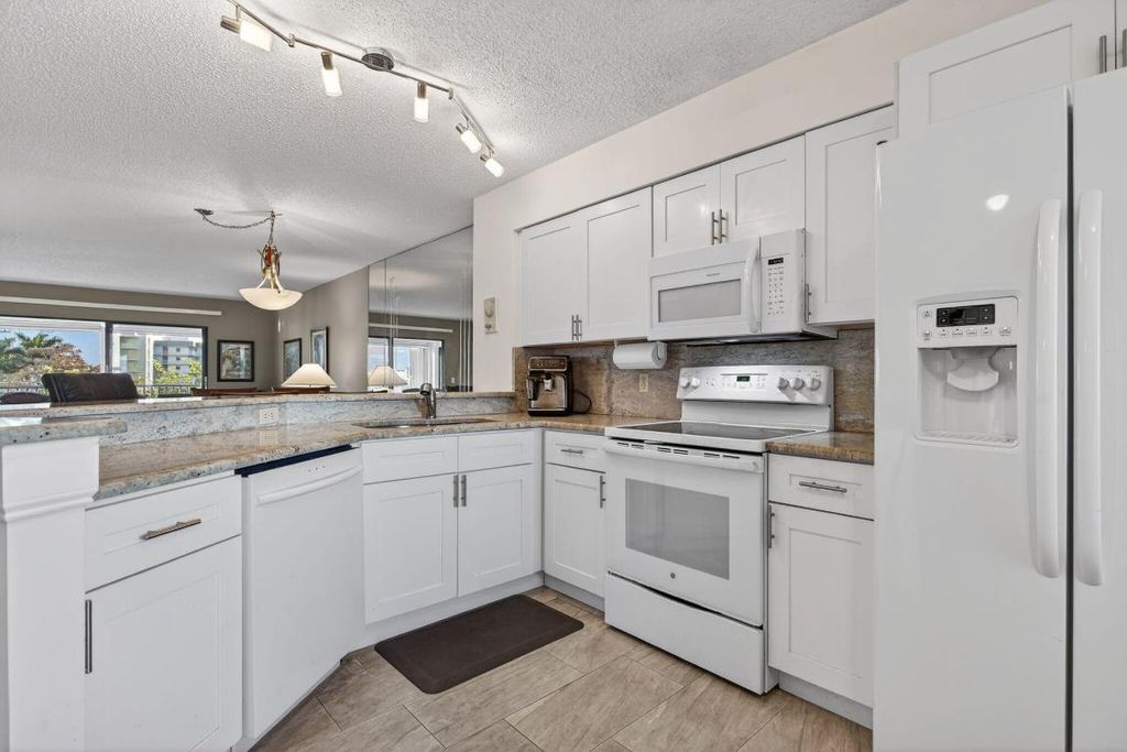 Photo of 2240 N Cypress Bend Drive #601, Pompano Beach, FL 33069 (MLS # R11156249)