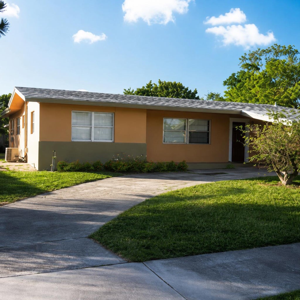 Photo of 920 NE 50th Street, Deerfield Beach, FL 33064 (MLS # B26063637)
