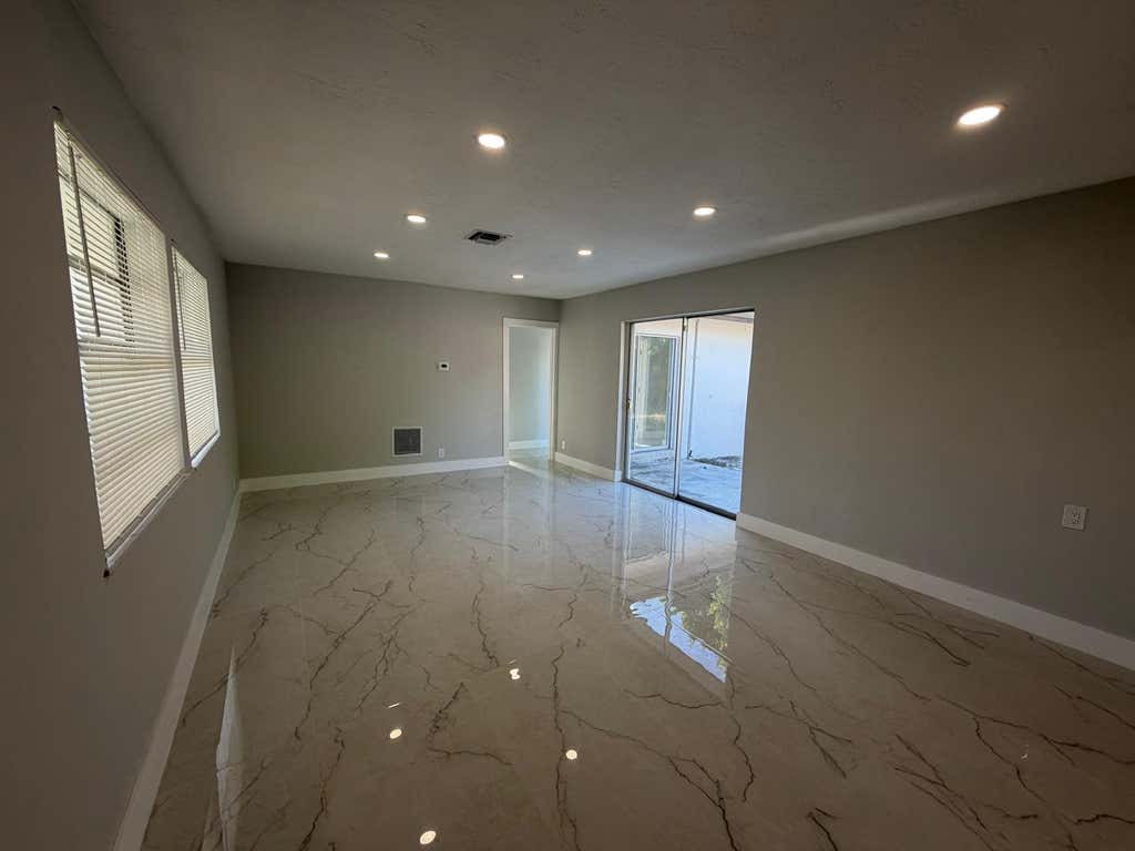 Photo of 920 NE 50th Street, Deerfield Beach, FL 33064 (MLS # B26063637)