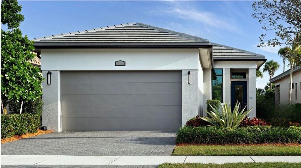 Photo of 199 SE Via Sangro, Port Saint Lucie, FL 34952 (MLS # R11158537)