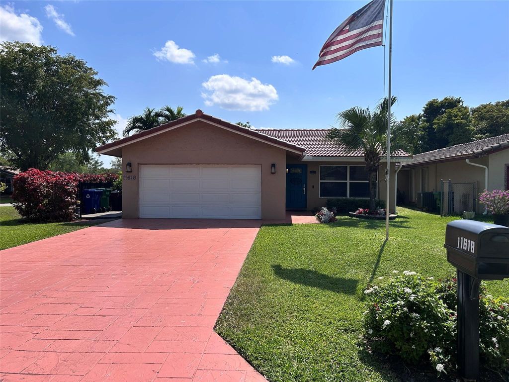 Photo of 11618 NW 27th Street, Coral Springs, FL 33065 (MLS # F10488643)