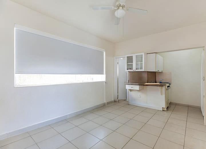 Live steps from the sand in this beautifully furnished and stylishly updated studio apartment, ideally located in the vibrant North Beach neighborhood of Miami Beach. Just one block from the ocean and minutes from world-renowned Bal Harbour Shops, this ground-floor unit sits in a quiet, gated, and secure complex offering peace, privacy, and convenience. The bright, airy space is designed for comfort, with tasteful furnishings and a layout that makes the most of the natural light. Outside your door, enjoy the best of coastal living—morning walks along the beach, bike rides on the scenic Ocean Terrace path, and evenings dining at local gems that blend Latin, Mediterranean, and classic Miami flavors.