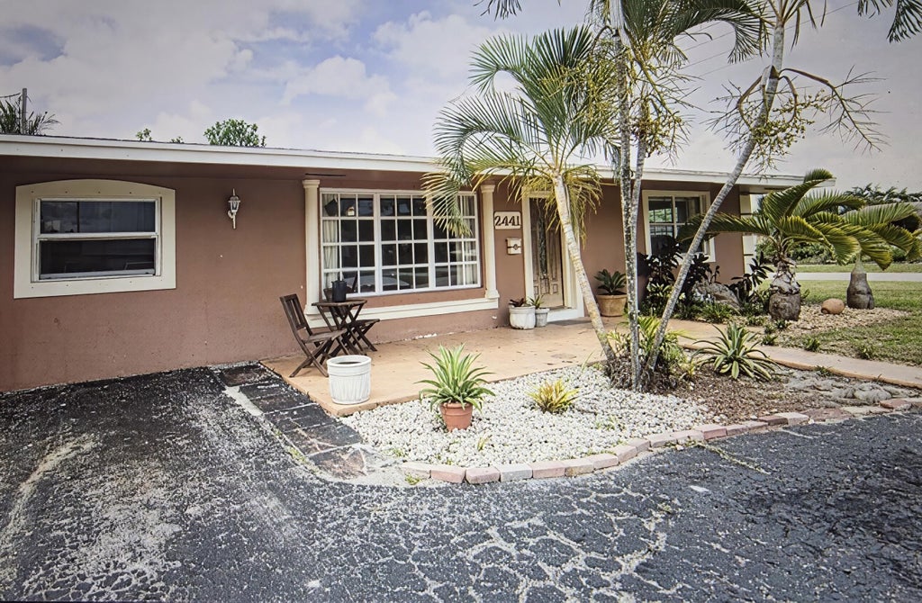 Photo of 2441 PINE TREE Drive, Miramar, FL 33023 (MLS # B26053310)