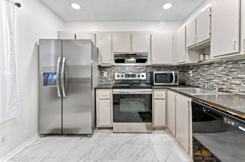 Tiny photo for 7904 SW 8th Street, North Lauderdale, FL 33068 (MLS # B26034182)
