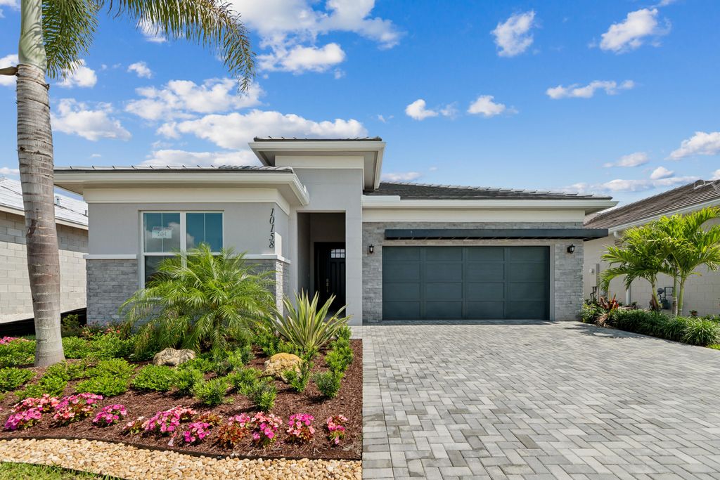 Photo of 10158 Timber Crk Way, Palm Beach Gardens, FL 33412 (MLS # B26005164)