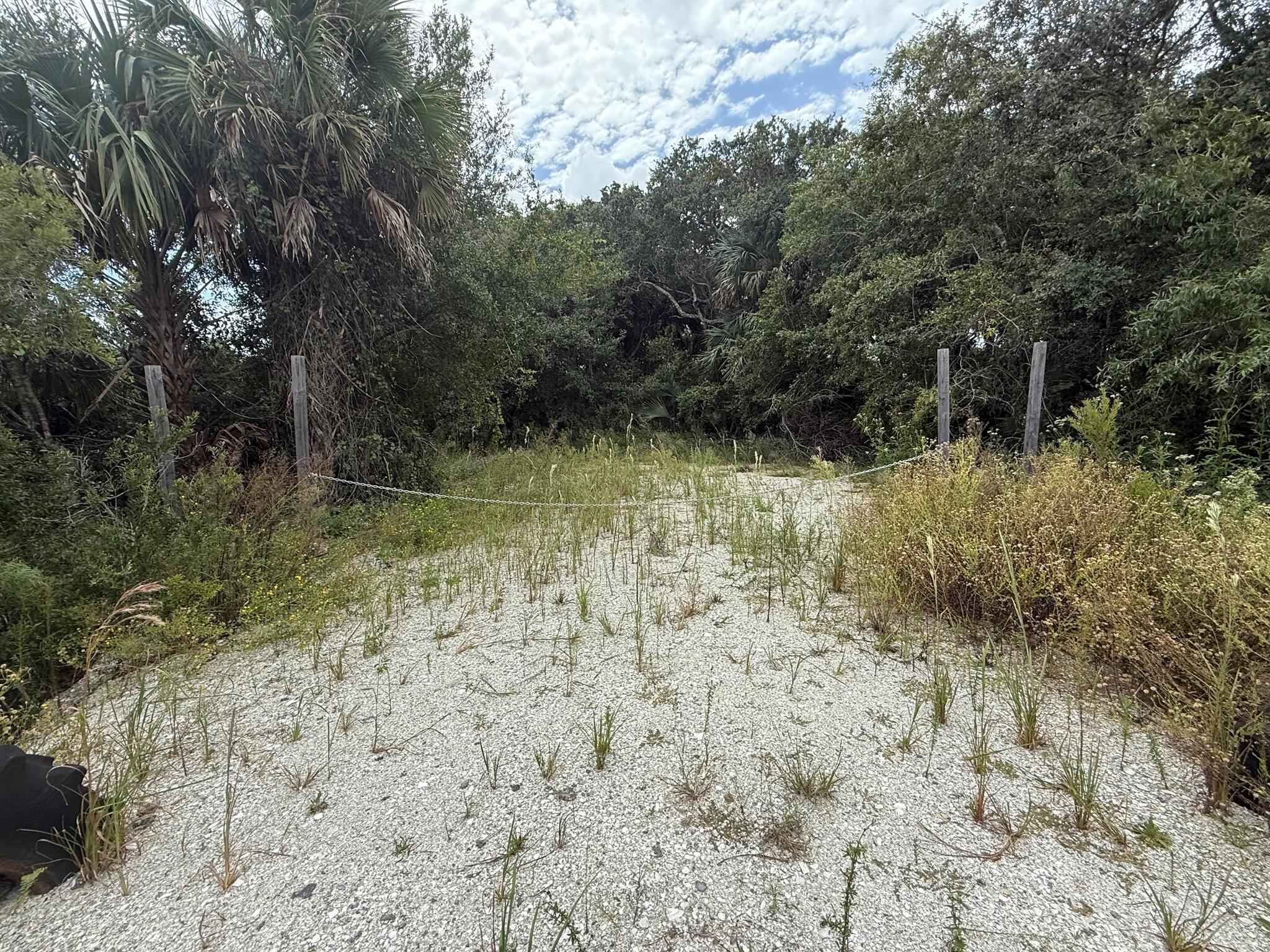 Situated not to far off a paved road and directly across from the breathtaking Kissimmee Prairie Preserve State Park, this 1.25-acre lot offers stunning morning views, unforgettable sunsets, and extra privacy in Okeechobee's Viking/Prairie area. The property features a culvert for easy access and is partially cleared--ready for your vision. This versatile parcel is a blank canvas for your dream home, weekend retreat, or investment project. Zoned residential/agricultural, it allows for mobile homes, livestock, farming, and recreational use. Enjoy the freedom of rural living with no HOA and plenty of space for equipment, animals, or off-grid potential. Located a short drive from the town of Okeechobee and Lake Okeechobee's world-renowned fishing, this lot blends peaceful seclusion with