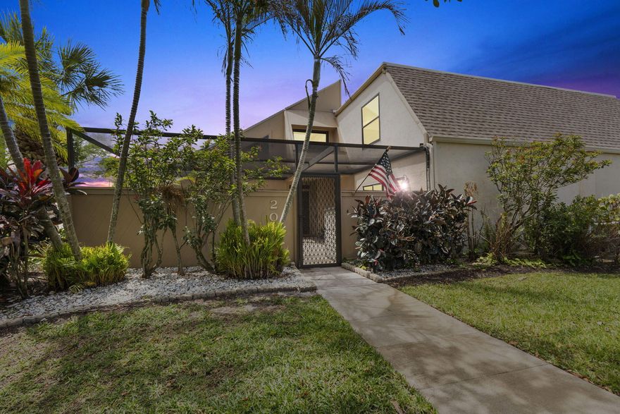 Spacious two-story villa with flexible 3-bedroom potential in Tarpon Bay Villas! This versatile 2-bedroom, 2-bath home with a den offers the potential for a 3rd bedroom, home office, or flex space to fit your needs. Located in the heart of Port St. Lucie, this unique home features soaring cathedral ceilings that create an open and airy feel throughout the main living area.   The updated kitchen and bathrooms add modern style, while wood-look tile flooring on the first floor provides both durability and charm. Enjoy added peace of mind with impact windows, a 2019 roof, and a 2024 water heater. Relax year-round in the screened lanai/patio—perfect for morning coffee or evening unwinding.  The upstairs den (with closet and balcony) overlooks the main living area and is enhanced with plantation shutters for added separation offering flexible use as a home office, guest space, or potential 3rd bedroom. With its distinctive layout, generous square footage, and convenient location, this villa is full of opportunity. Conveniently located near Pioneer Park, local golf courses, shopping, dining, and the Voco Sandpiper All-Inclusive Resort.  Sale subject to lender approval.