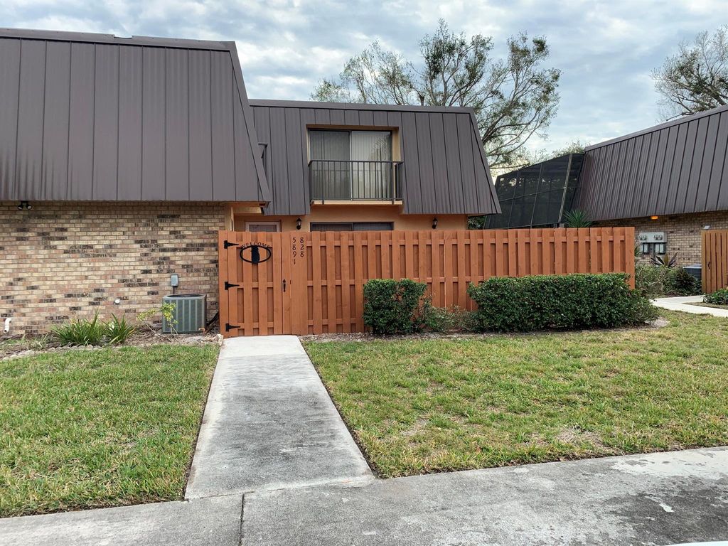 Photo of 5891 SE Windsong Lane #828, Stuart, FL 34997 (MLS # R10891816)
