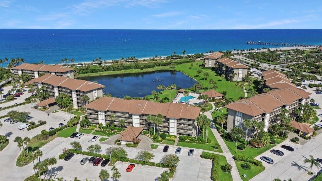 Photo of 301 S Seas Drive #203, Jupiter, FL 33477 (MLS # R10999546)