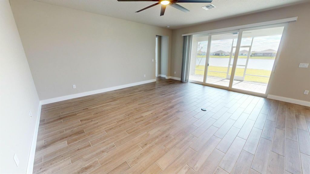 Photo of 6335 NW Sweetwood Drive, Port Saint Lucie, FL 34987 (MLS # R11040950)