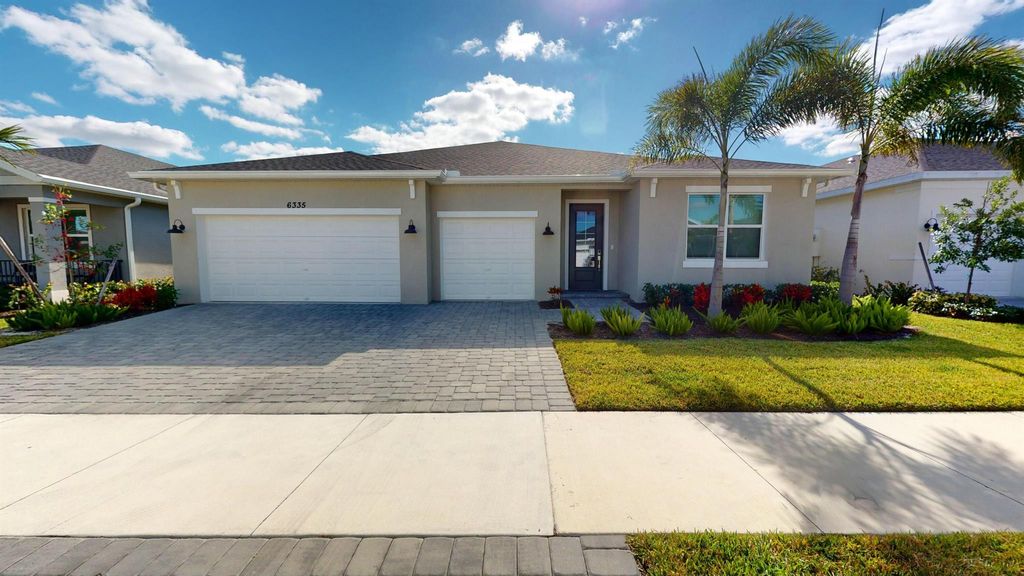 Photo of 6335 NW Sweetwood Drive, Port Saint Lucie, FL 34987 (MLS # R11040950)