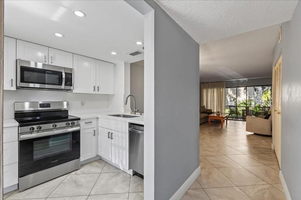 Photo of 2355 SW 15th Street #77, Deerfield Beach, FL 33442 (MLS # F10549767)