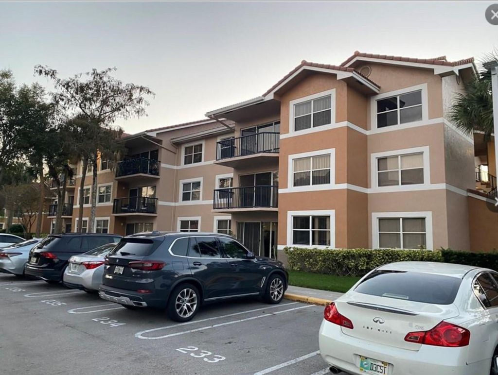 Photo of 9055 Wiles Road #307, Coral Springs, FL 33067 (MLS # F10503013)