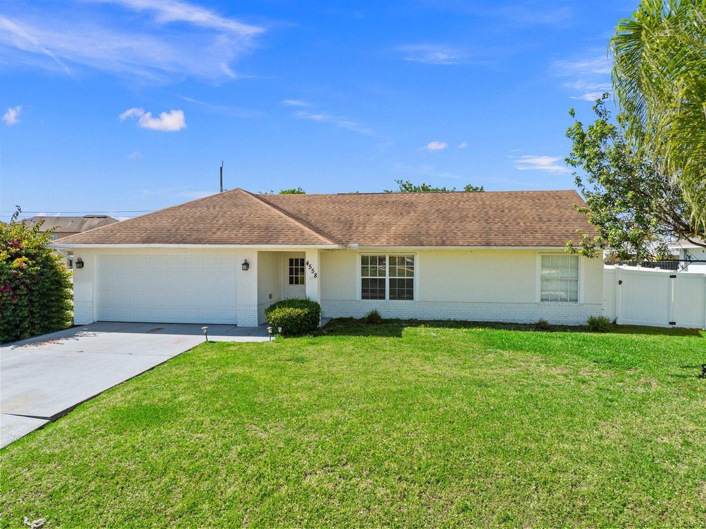 Photo of 4558 SW Cacao Street, Port Saint Lucie, FL 34953 (MLS # R11074031)